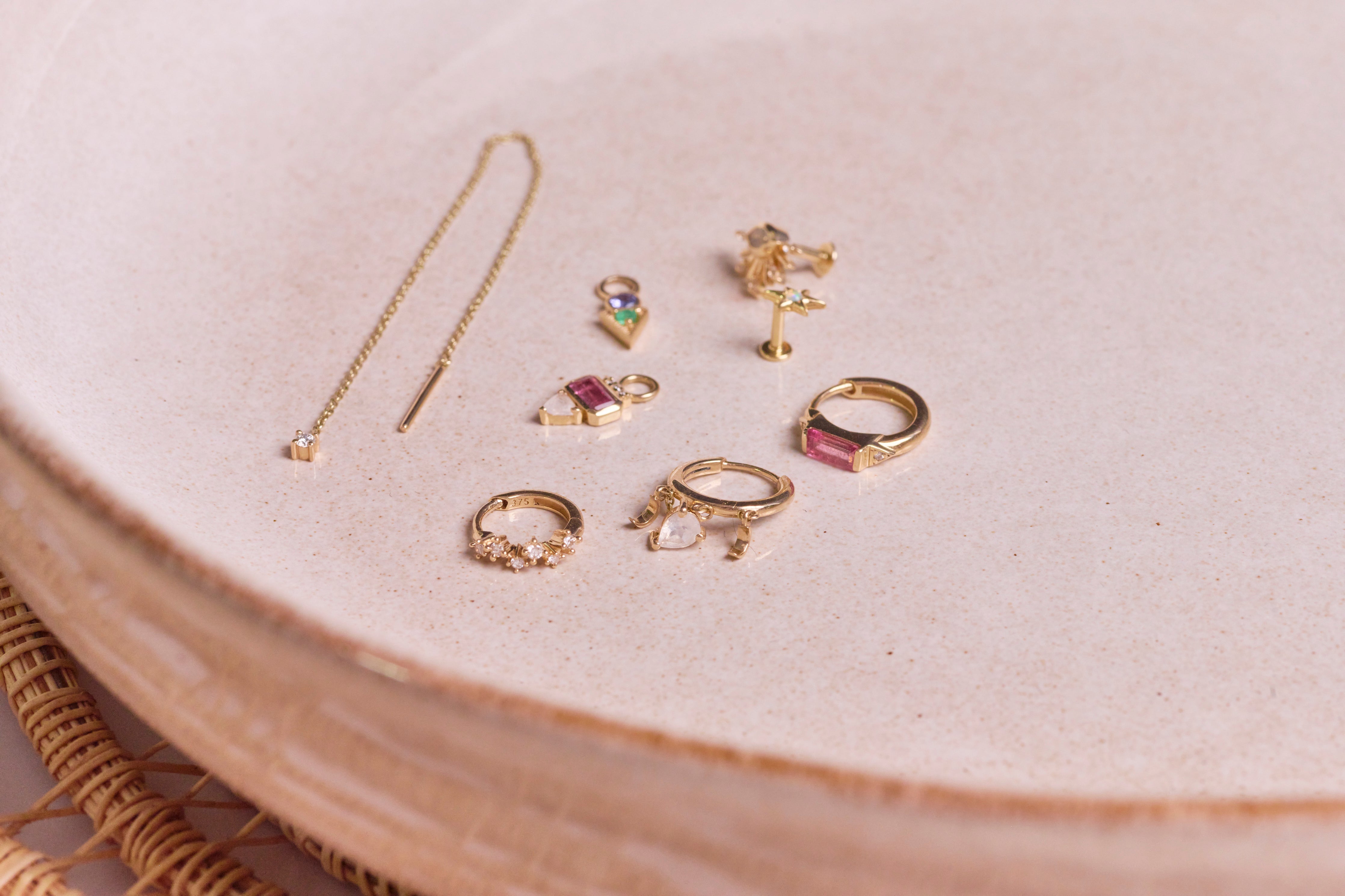 solid gold lobe piercings