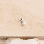 Pearl & Turquoise Earring Charm Sterling Silver on hard surface