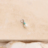 Pearl & Turquoise Earring Charm Sterling Silver on hard surface