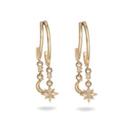 Gold earrings with star and moon designs on a white background
