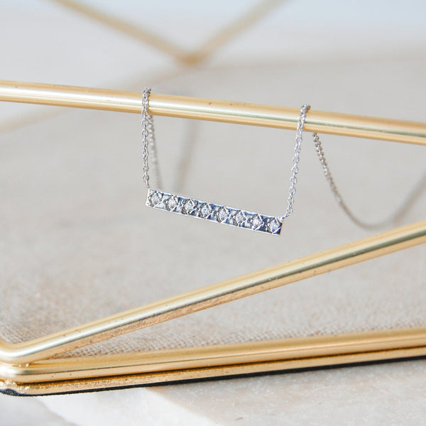 Diamond Bar Bracelet 9k White Gold hanging from jewellery tray bar 