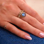 model hand wearing solid gold ring stack including the Diamond Star Chain Ring 9k Gold
