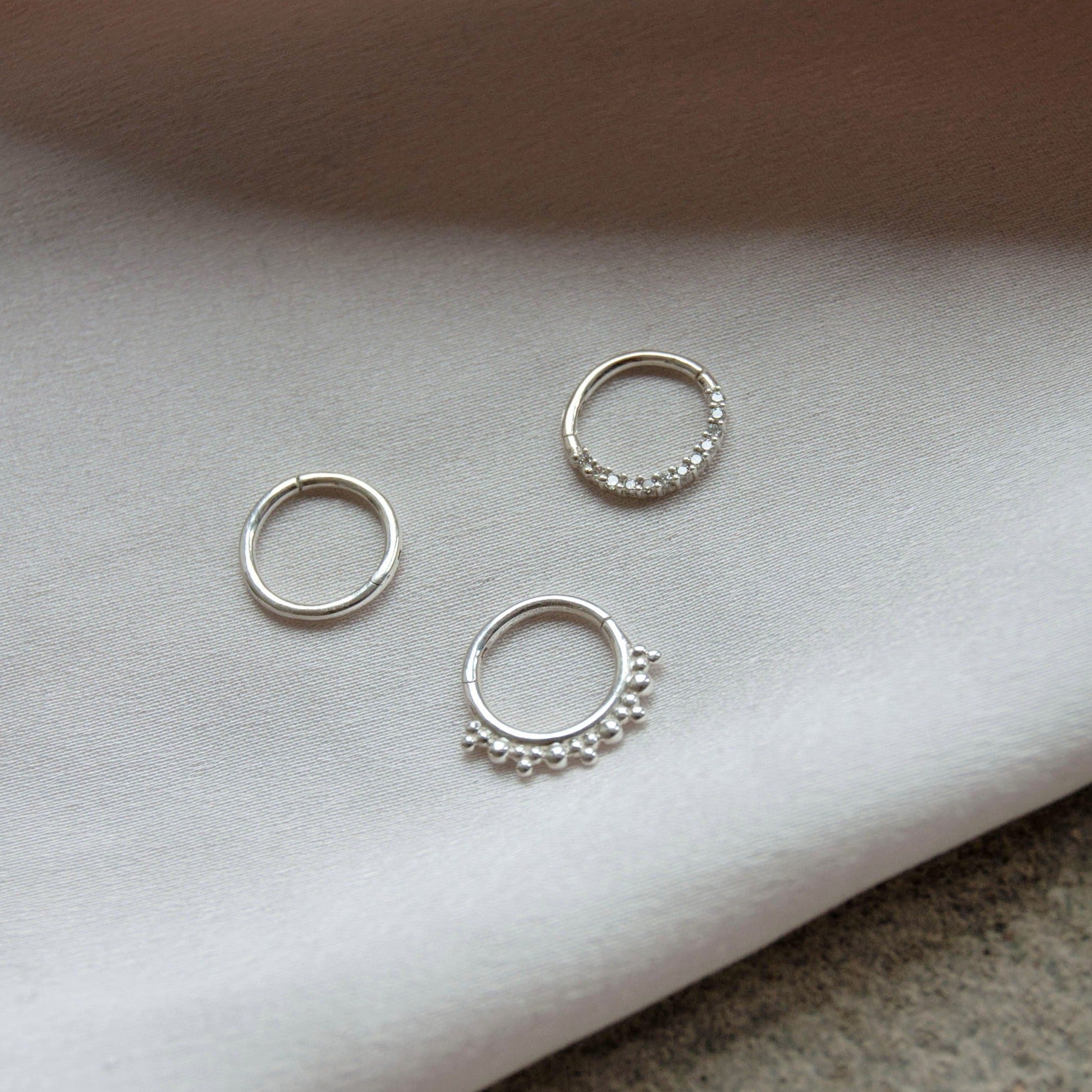 three daith hoops