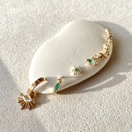 solid gold ear stack including the Emerald Marquise Beaded Flat Back Earring 9k Gold