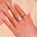 Emerald & moonstone rings on model