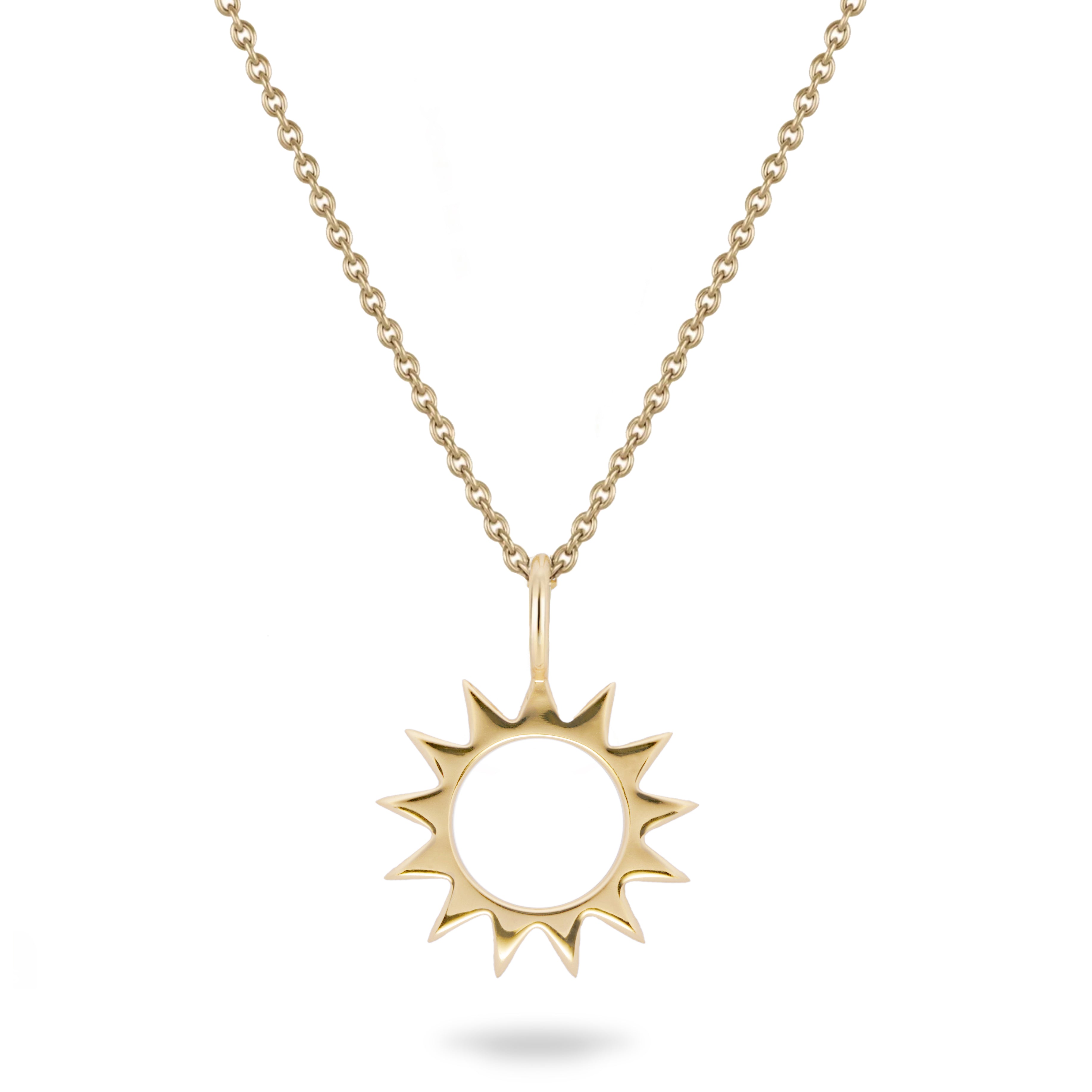 Solid gold sunburst pendant