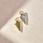 Labradorite Rhombus Earring Charm 9k Gold on hard surface