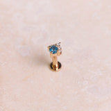 London Blue Topaz & Diamond Arrow Flat Back 9k Gold on hard surface