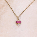 Pink Tourmaline, Diamond & Moonstone Necklace 9k Gold on hard surface