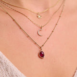 solid gold necklaces layered including the Rhodolite Garnet, Moonstone & White Sapphire Necklace 9k Gold