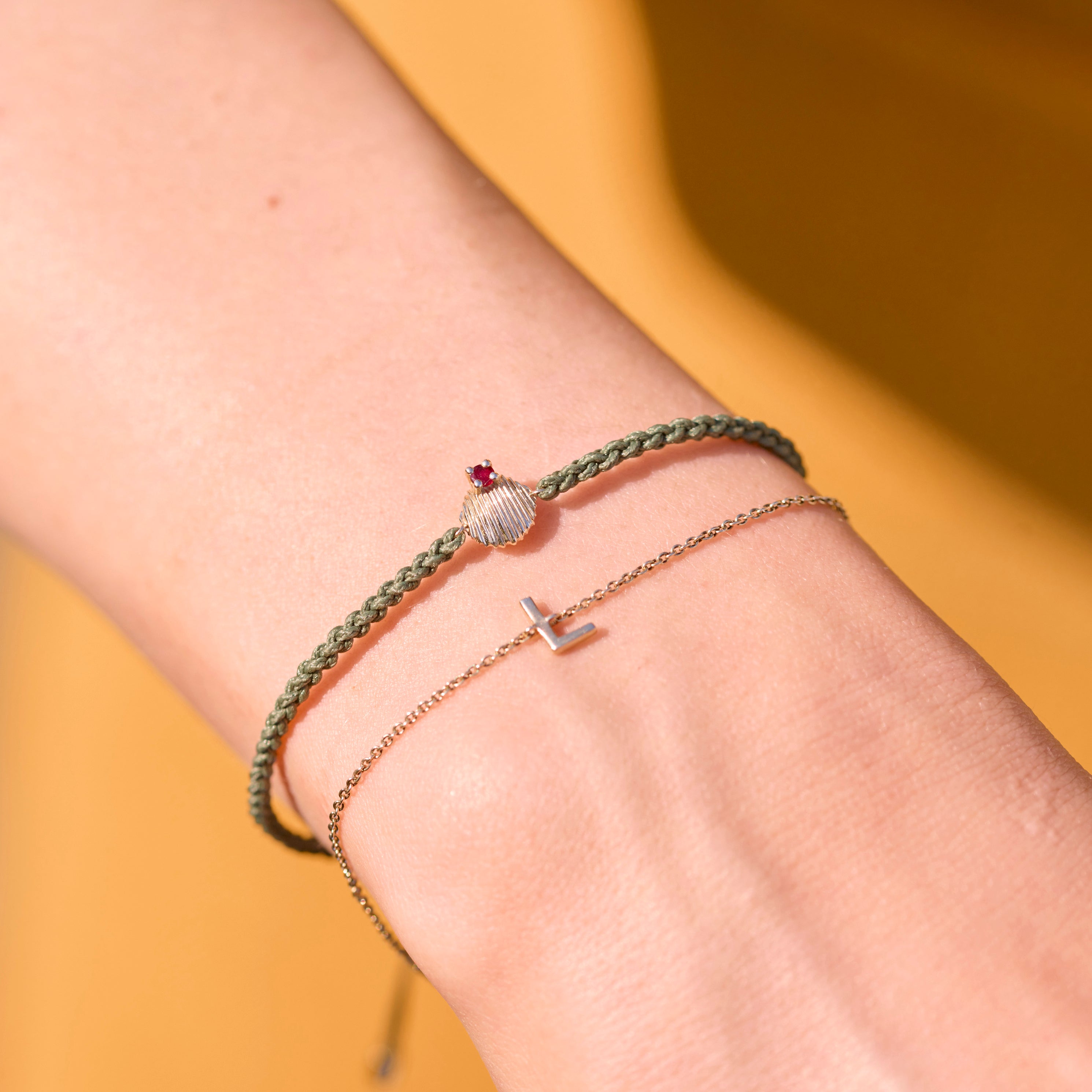 Gold bracelets on model