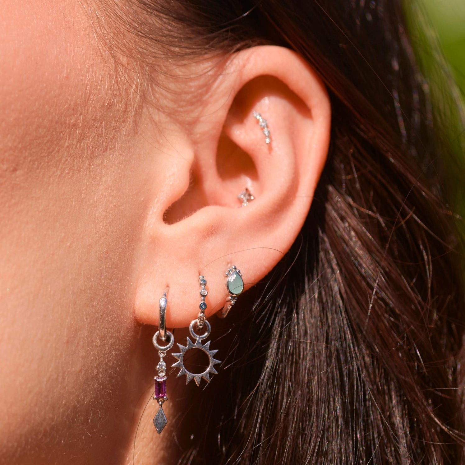 Silver jewellery on model