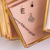 Name Pendant Sterling Silver in jewellery box with other sterling silver pendants