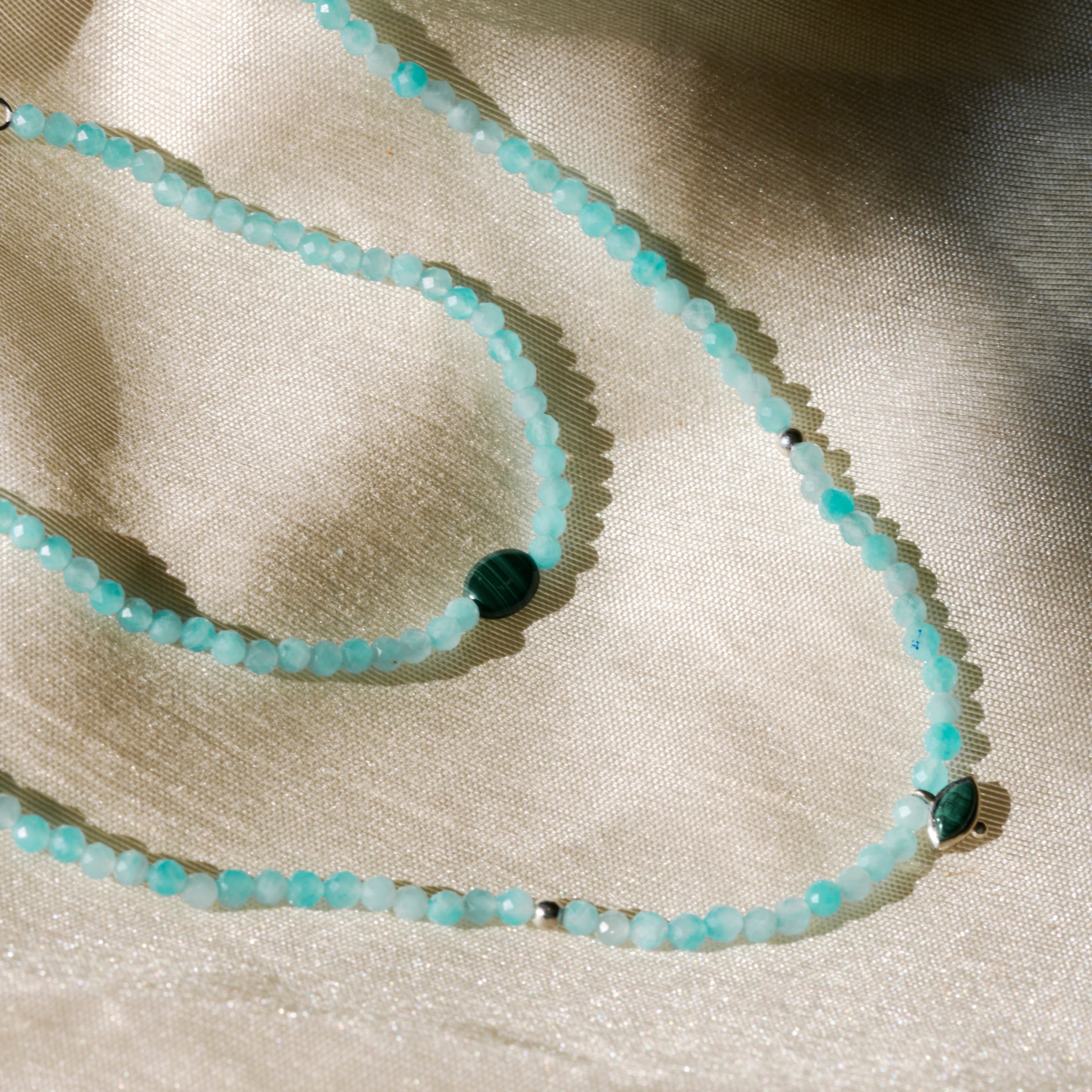 amazonite jewellery on fabric