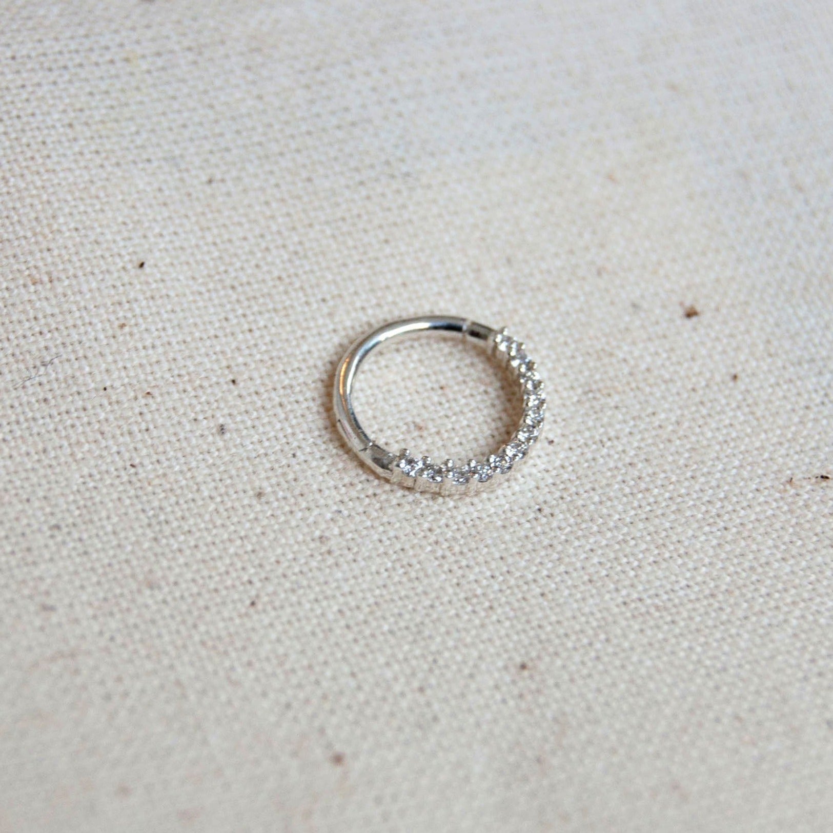 diamond daith hoop white gold on fabric