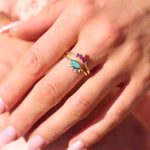 garnet rings in gold with diamonds on model