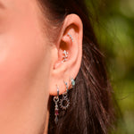 silver charms on ear