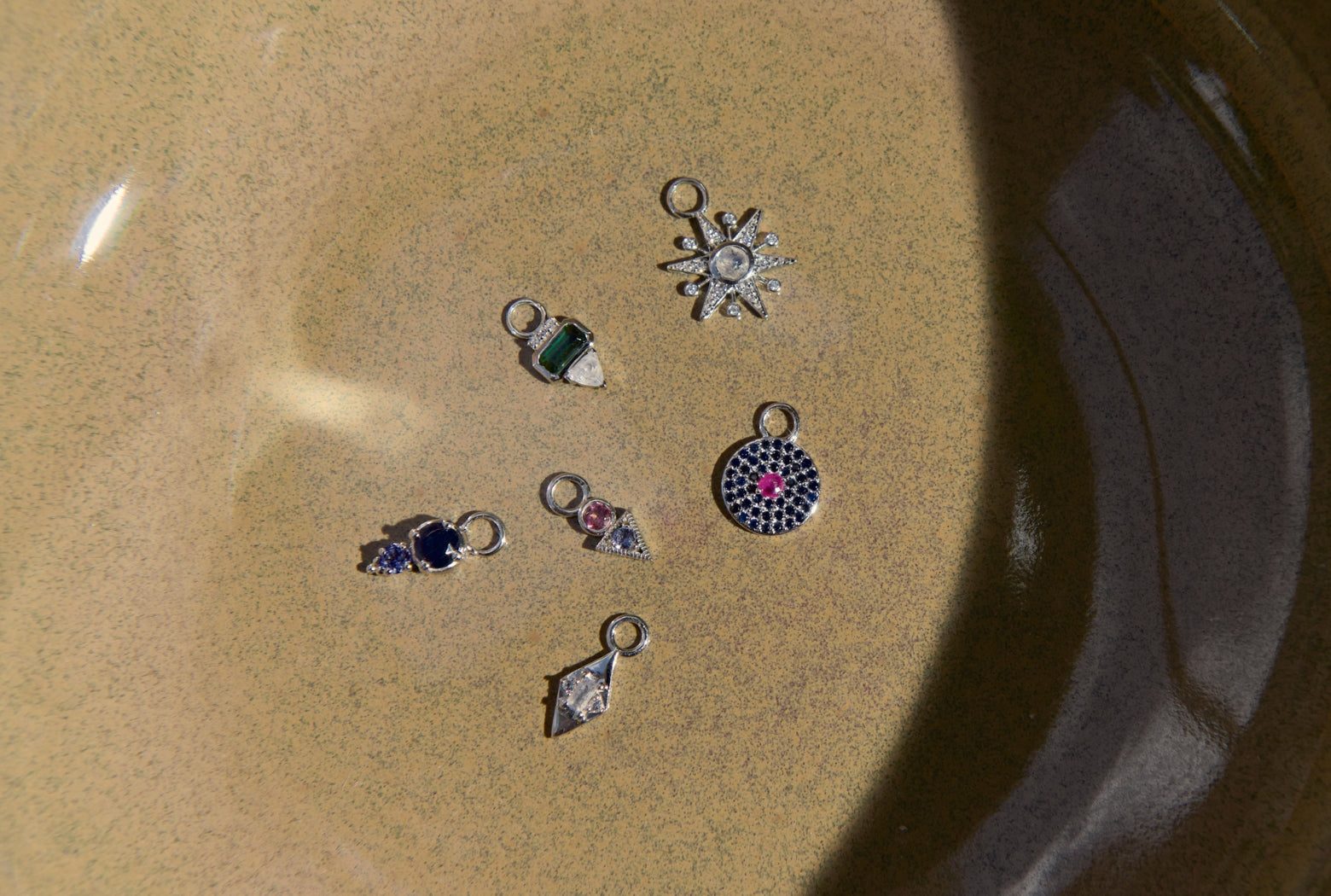 solid gold and sterling silver earring charms