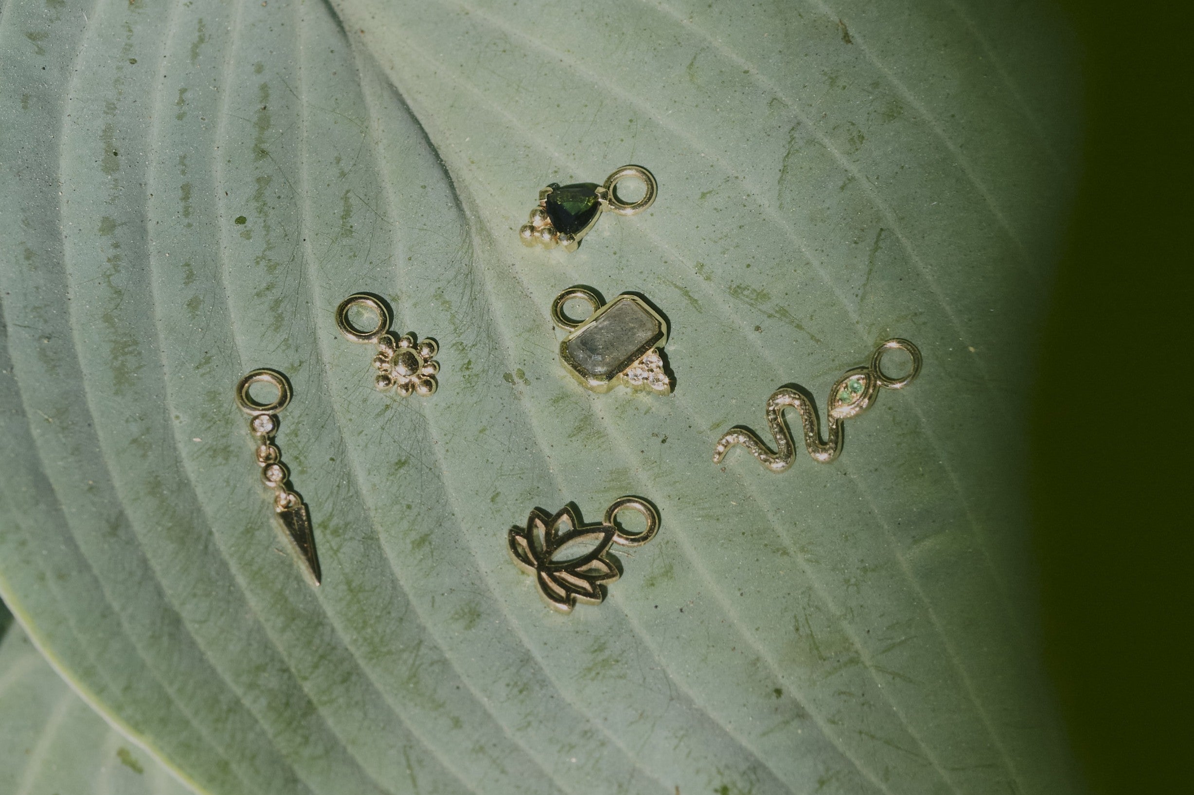 solid gold and sterling silver earring charms