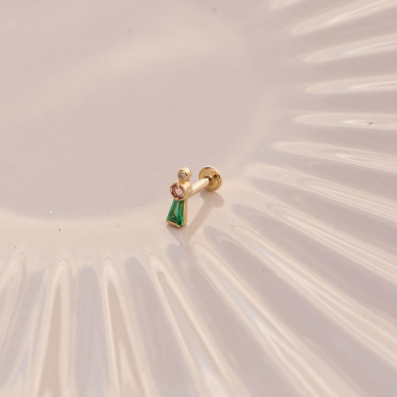 Emerald, Sapphire & Diamond Flat Back Earring 14k Gold displayed on a textured ceramic