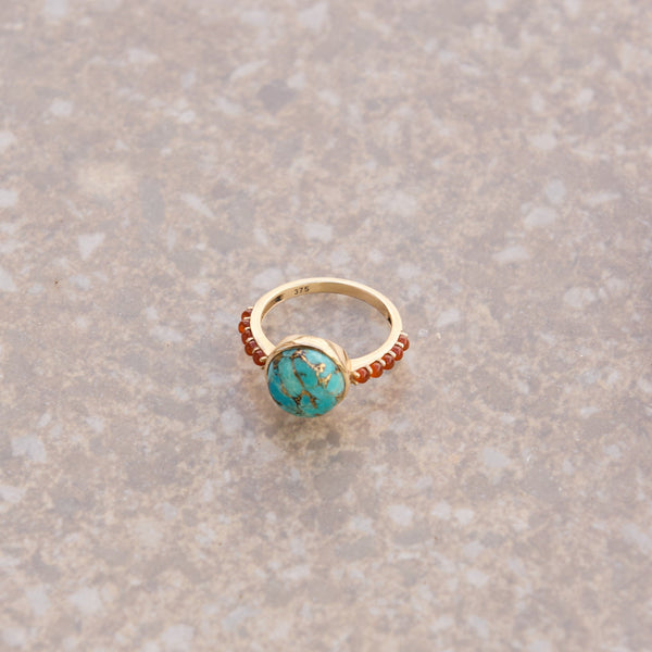 Copper Turquoise & Orange Carnelian Ring 9k Gold on hard surface