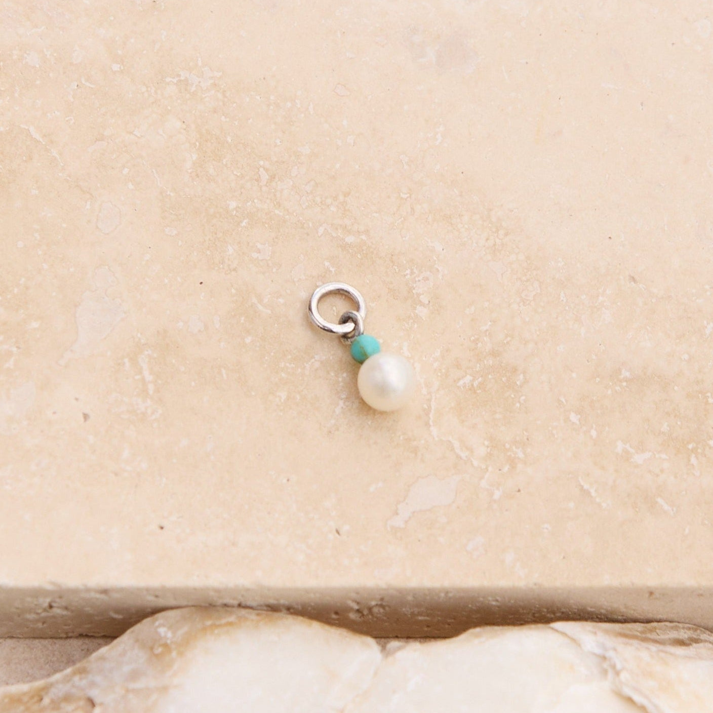 Pearl & Turquoise Earring Charm Sterling Silver on hard surface