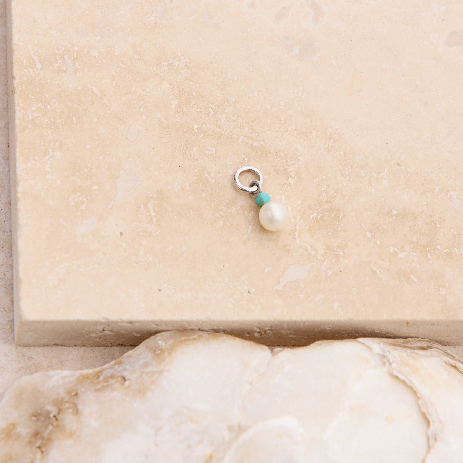 Pearl & Turquoise Earring Charm Sterling Silver on hard surface