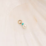 Pearl & Turquoise Earring Charm 9k Gold on hard surface