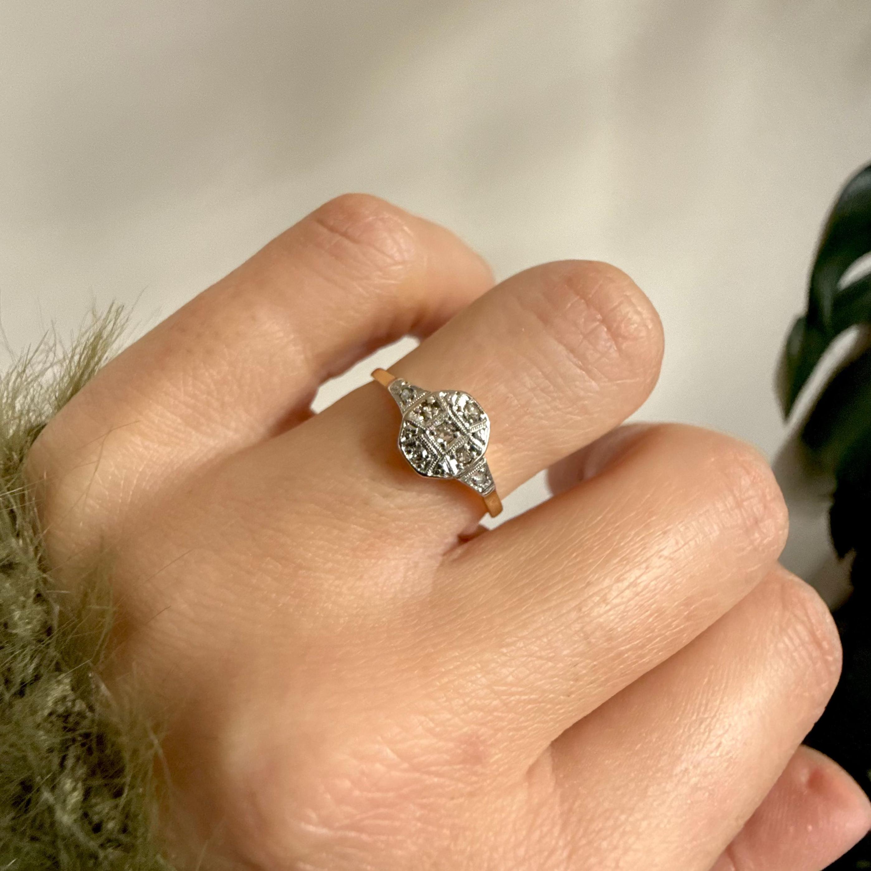 model wearing the 18kt Gold Diamond shield Vintage Ring