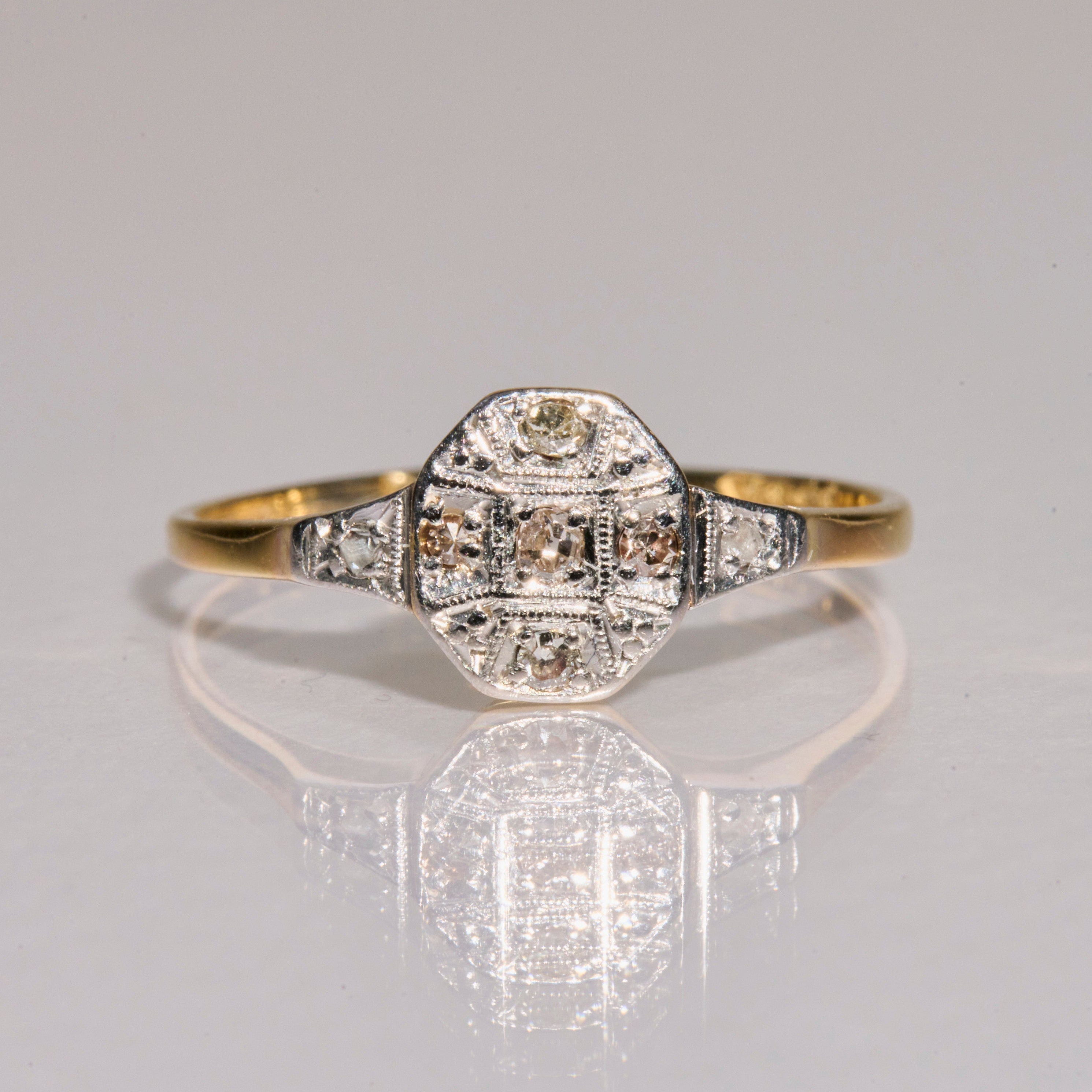 close up of the 18kt Gold Diamond shield Vintage Ring