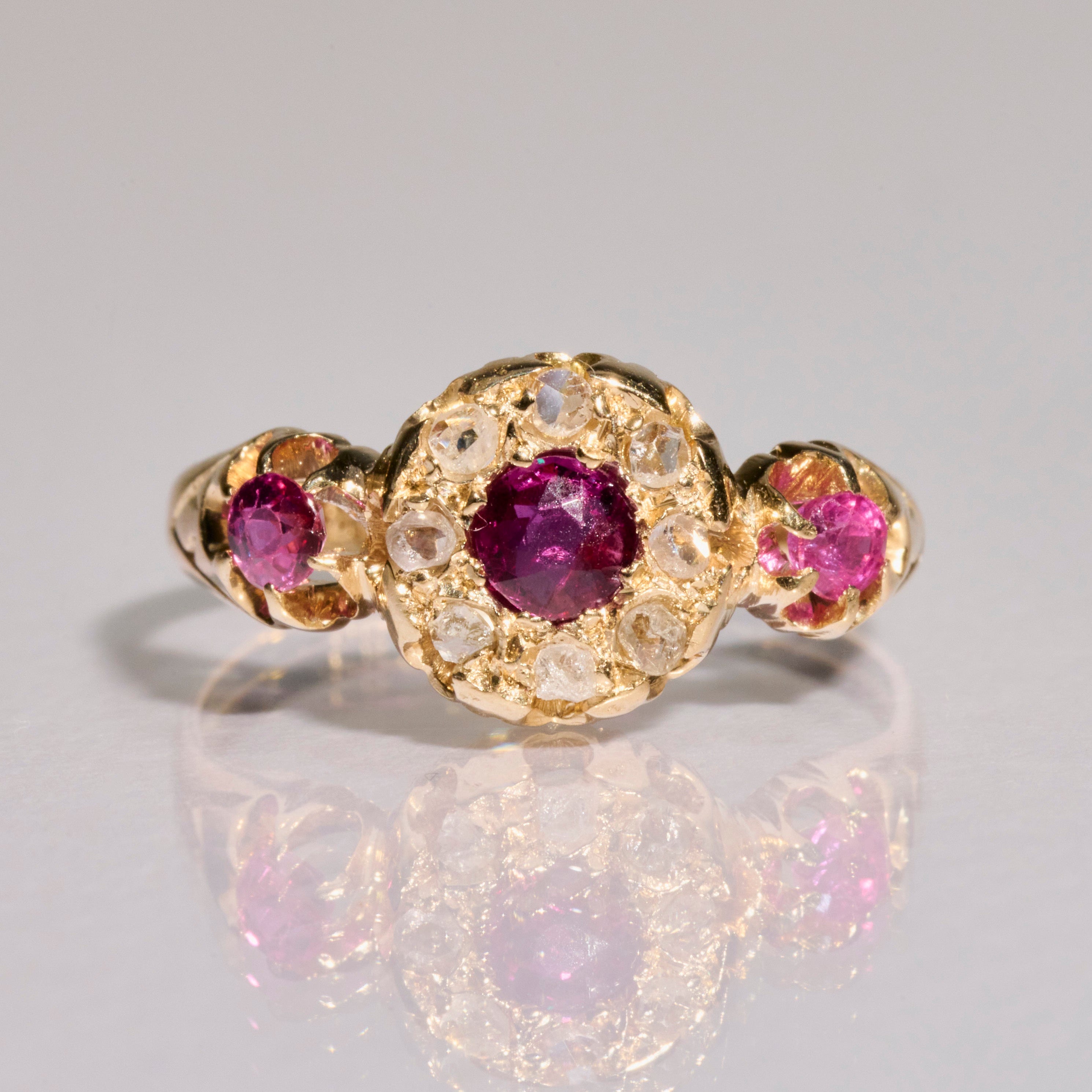 close up of the 18kt Gold Ruby & Diamond Cluster Vintage Ring
