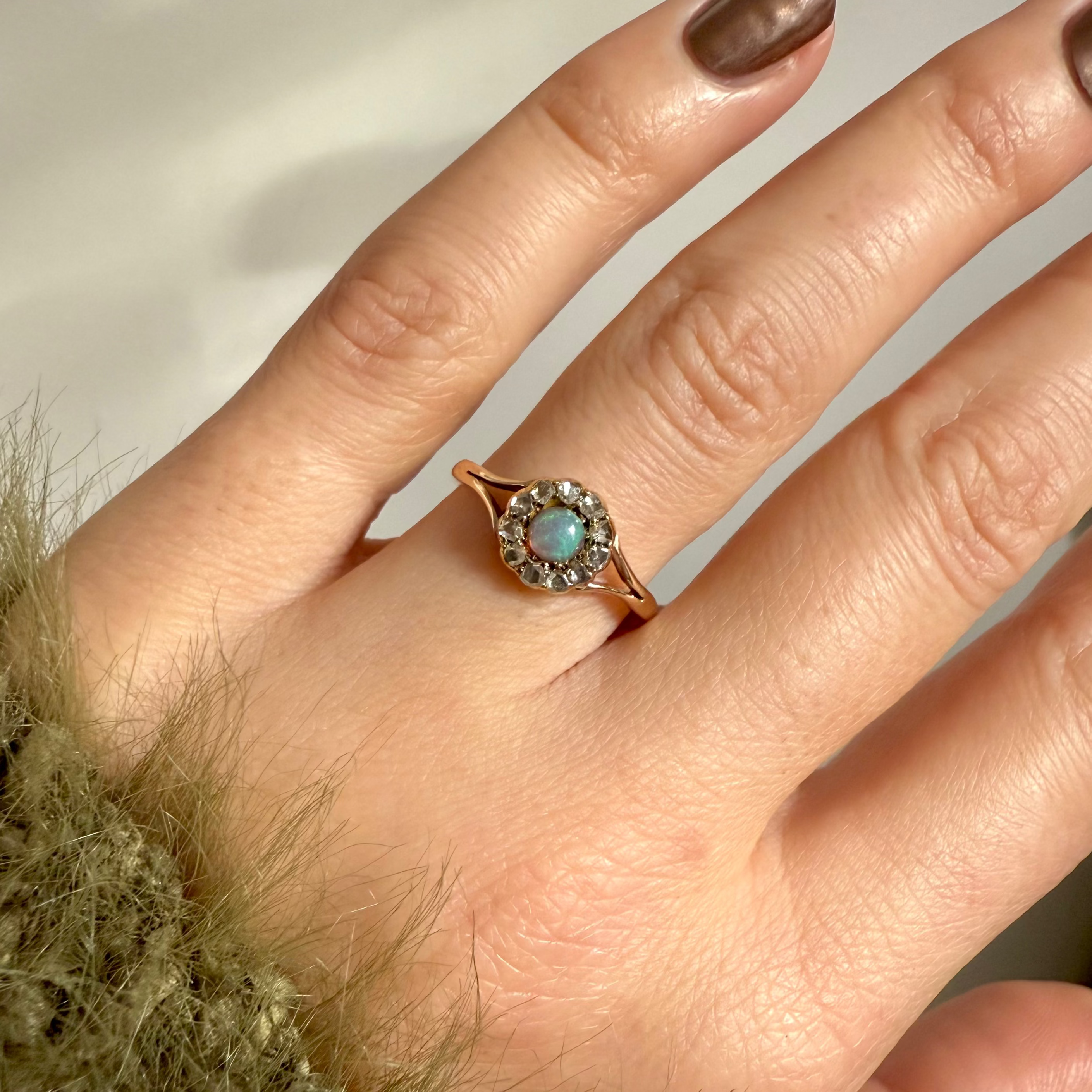 model wearing the 9kt Gold Opal & Diamond Vintage Ring