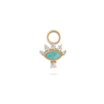 Gold charm with turquoise stone and clear stones on a white background
