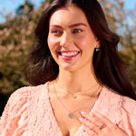 model wearing recycled solid gold necklaces including the Amazonite, Diamond & Moonstone Eye Necklace 9k Gold
