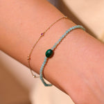 model wearing beaded and chain bracelet including the Amazonite & Malachite Beaded Bracelet Sterling Silver