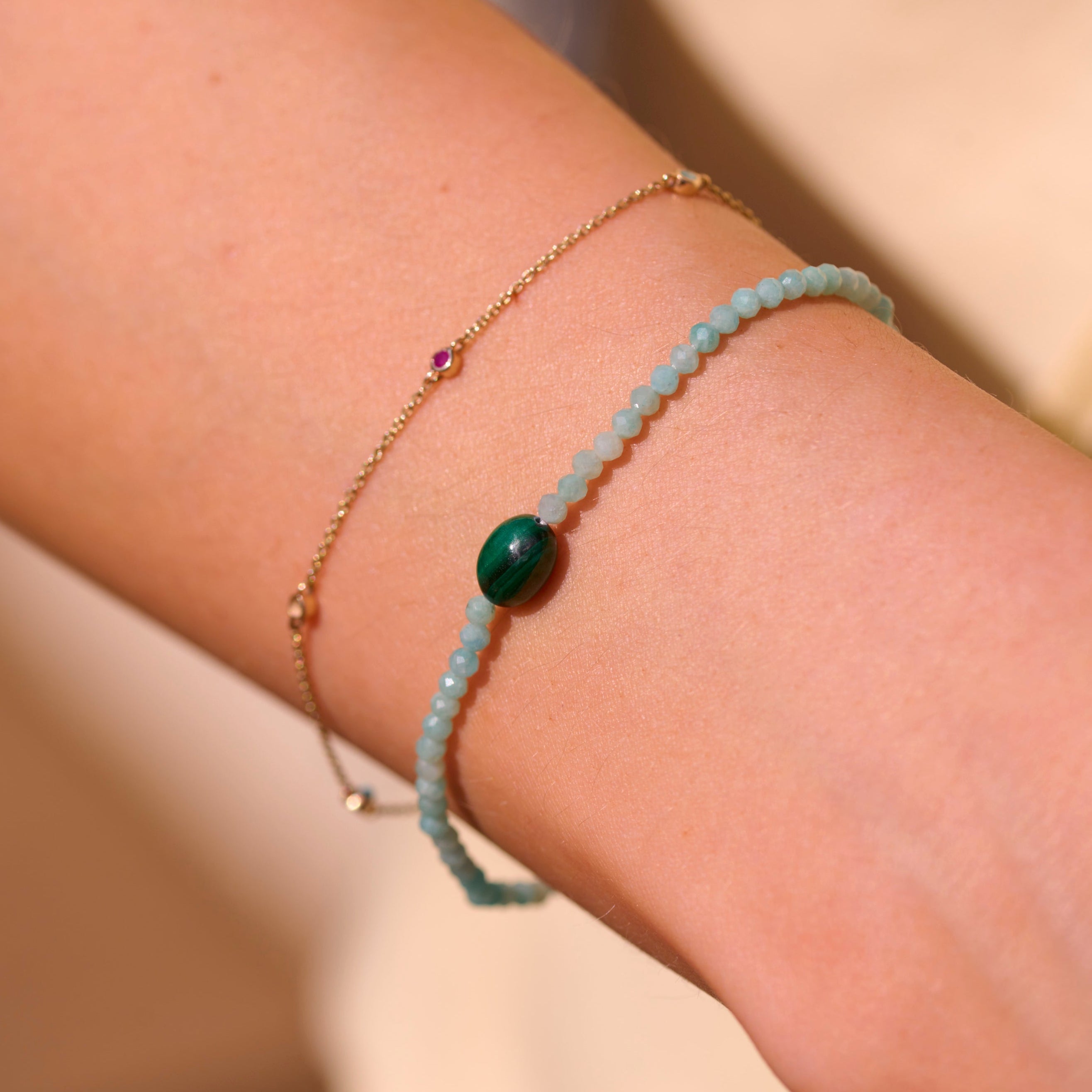 model wearing beaded and chain bracelet including the Amazonite & Malachite Beaded Bracelet Sterling Silver