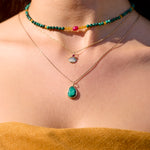 solid gold necklaces on model