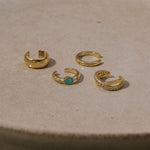 14k gold vermeil ear cuffs in porcelain dish including the Amazonite & White Sapphire Ear Cuff 14k Gold Vermeil


