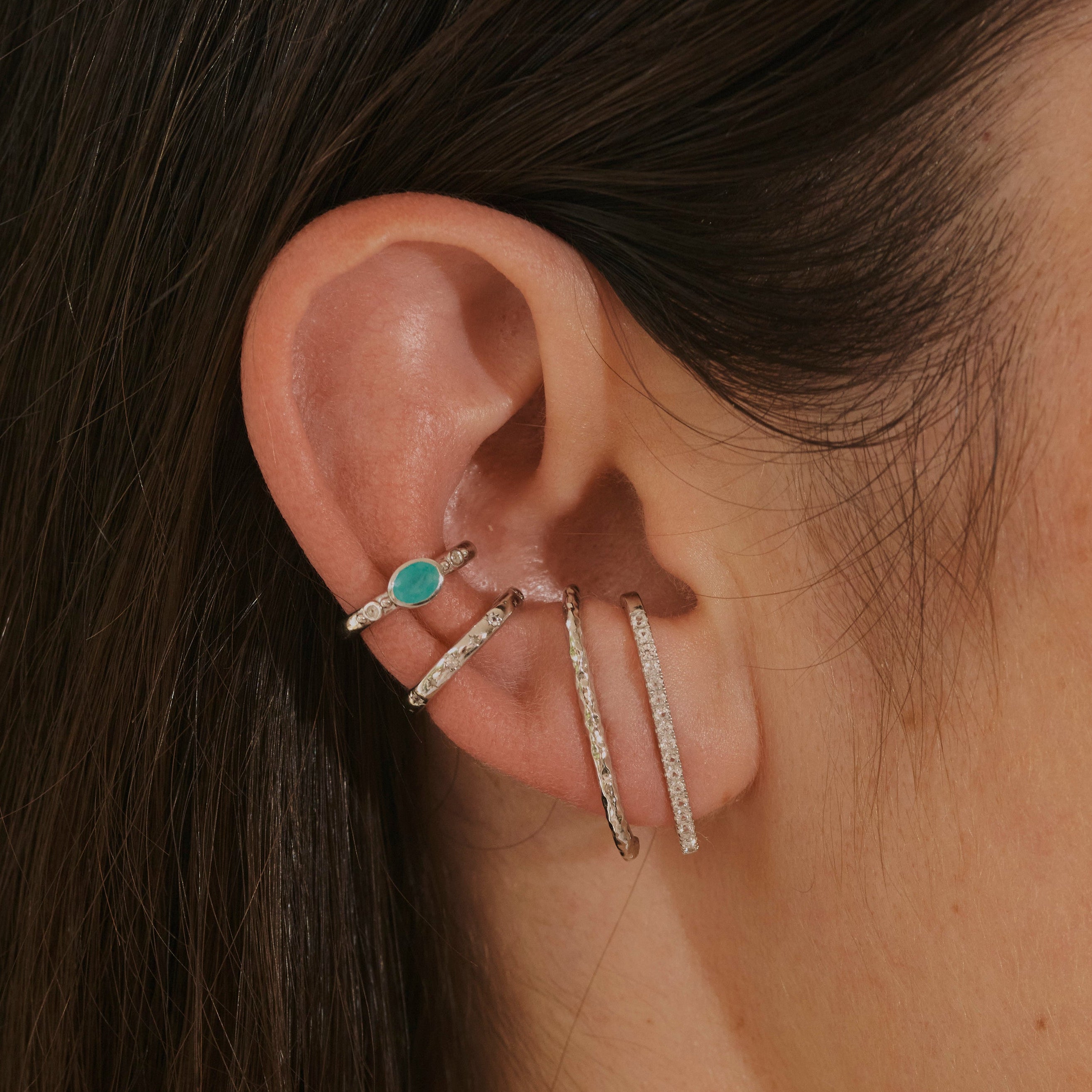 model wearing sterling silver suspender earrings and ear cuffs including the Amazonite & White Sapphire Ear Cuff Sterling Silver