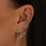 model wearing silver earrings and ear cuffs including the Amazonite & White Sapphire Ear Cuff Sterling Silver