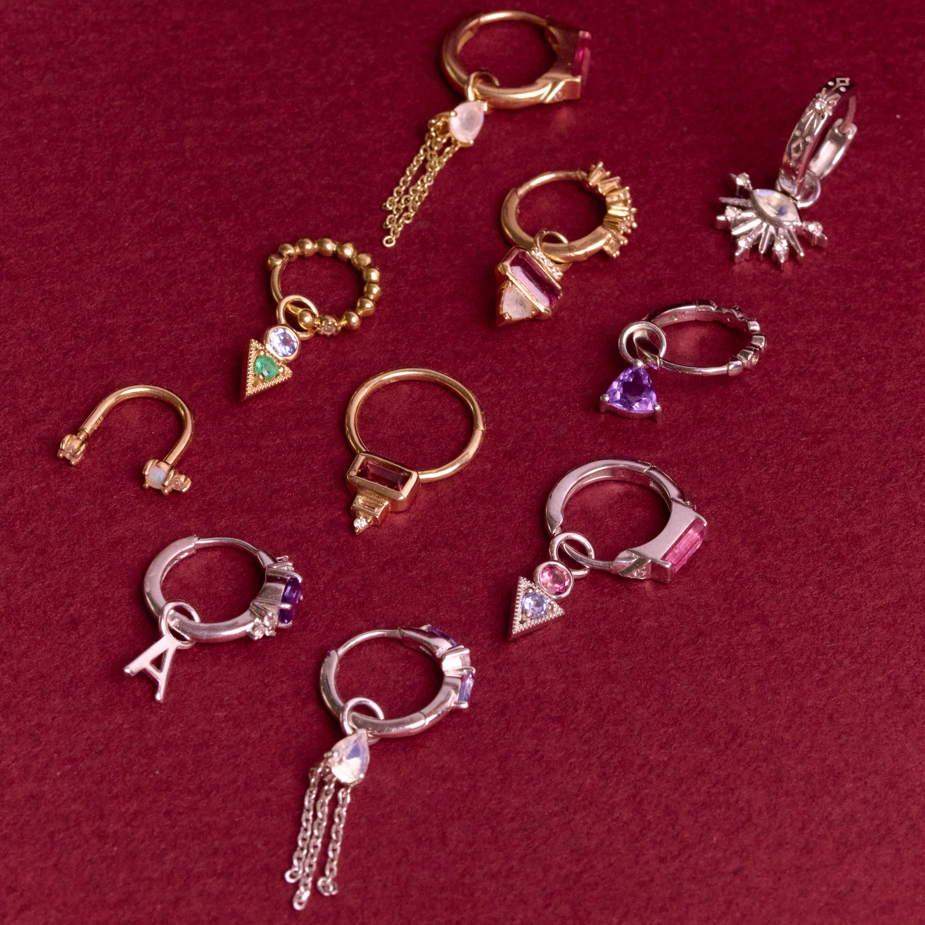 huggies and earring charms display including the Amethyst Trillion Earring Charm Sterling Silver