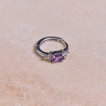 Amethyst & White sapphire Huggie Hoop Earring Sterling Silver on hard surface