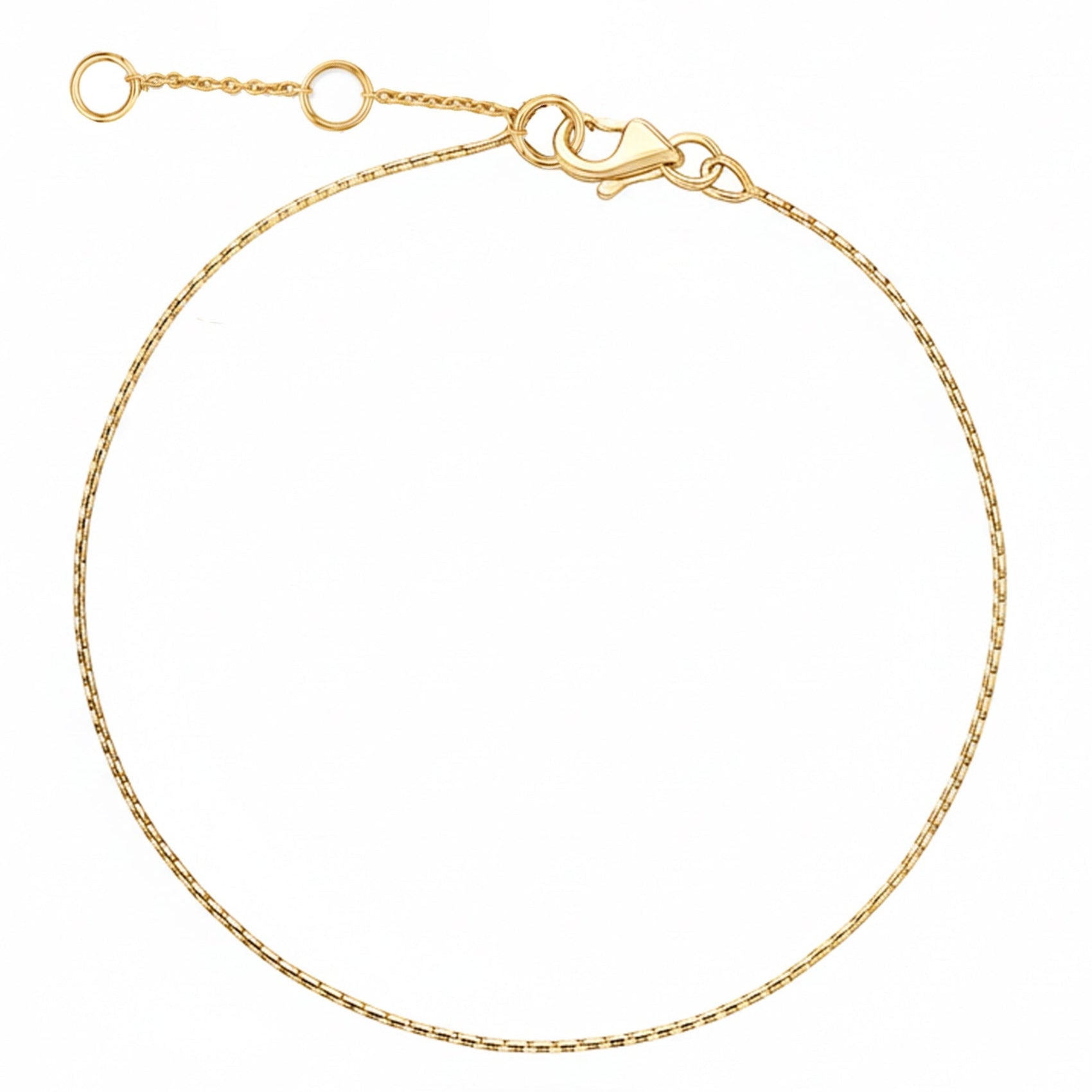 Gold bracelet on a white background