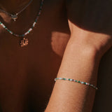 model wearing the Beaded Bracelet Sterling Silver and matching beaded necklace
