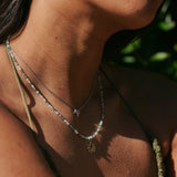 model wearing the Beaded Necklace Sterling Silver along with the lotus pendant