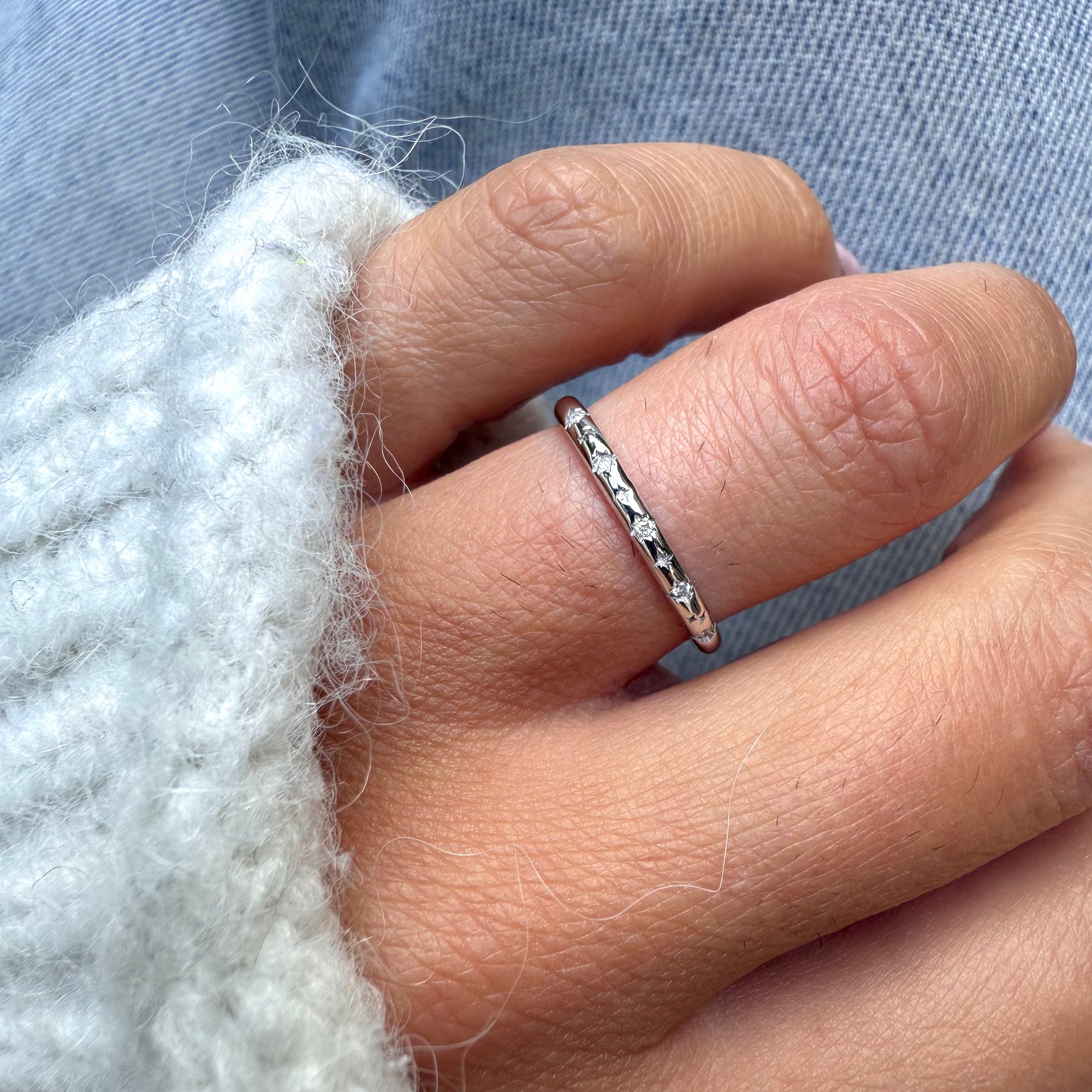 Celestial Diamond Band Ring White Gold on hand wearing a knit