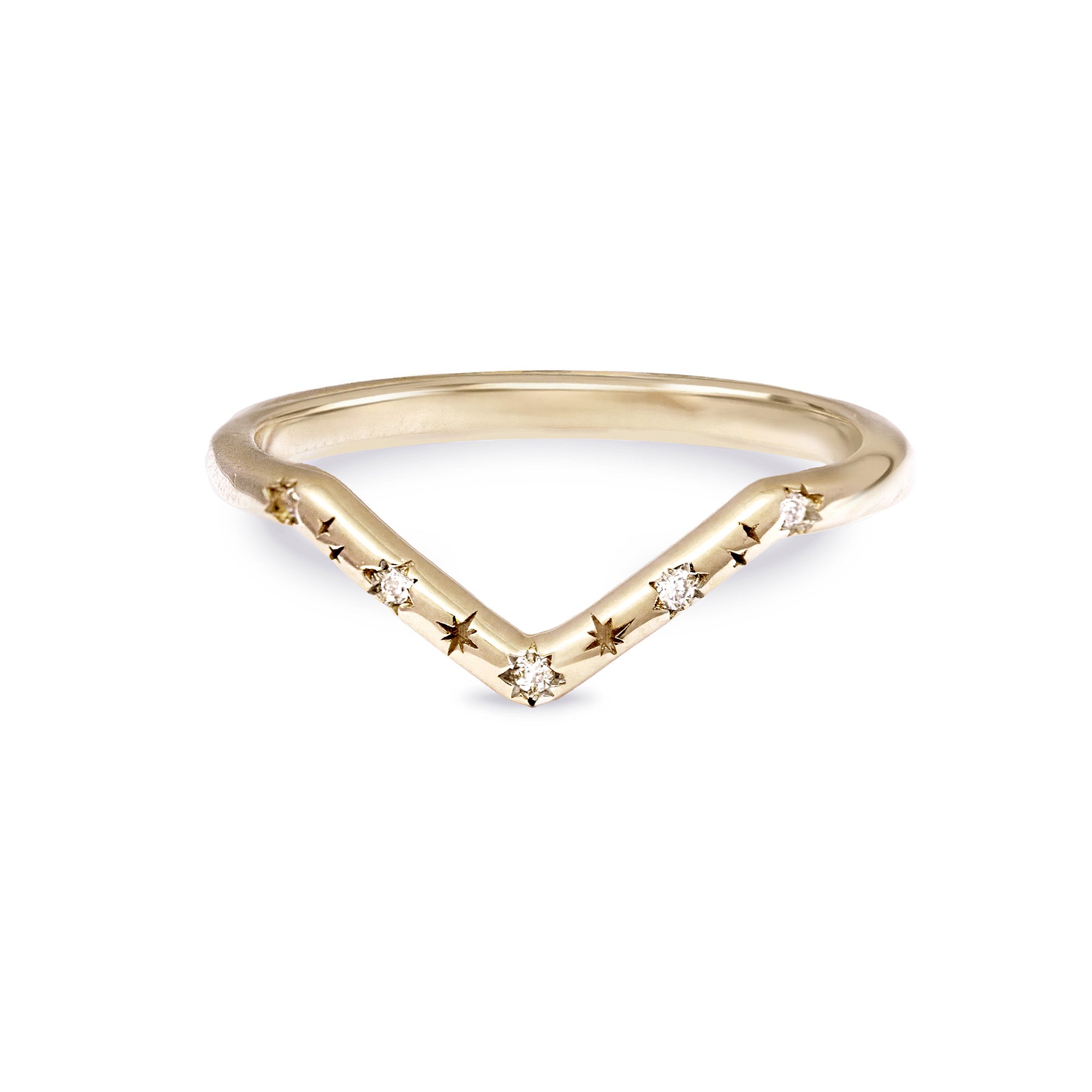 Gold ring with star-shaped cutouts on a white background