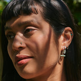 model wearing silver ear stack including the Chrysoprase T-Bar Earring Charm Sterling Silver