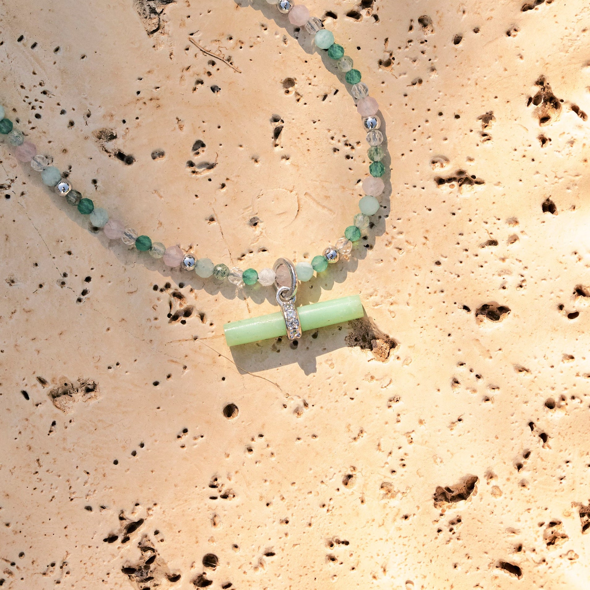 Chrysoprase T-Bar Pendant Sterling Silver on hard surface
