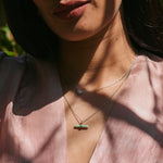model wearing Chrysoprase T-Bar Pendant Sterling Silver and Moonstone & Sapphire Sunburst Necklace
